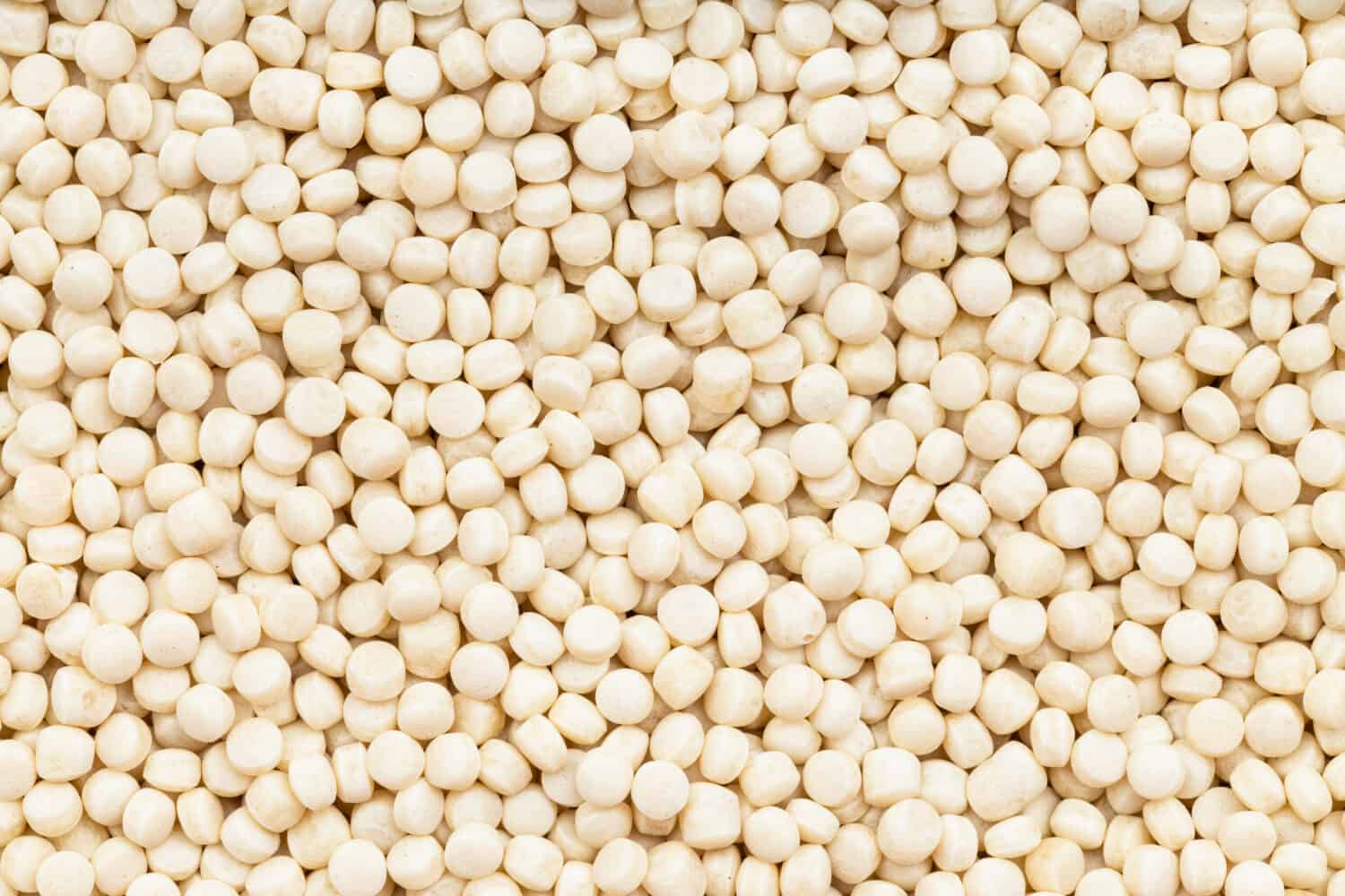 food background - many israeli pearl couscous grains close up