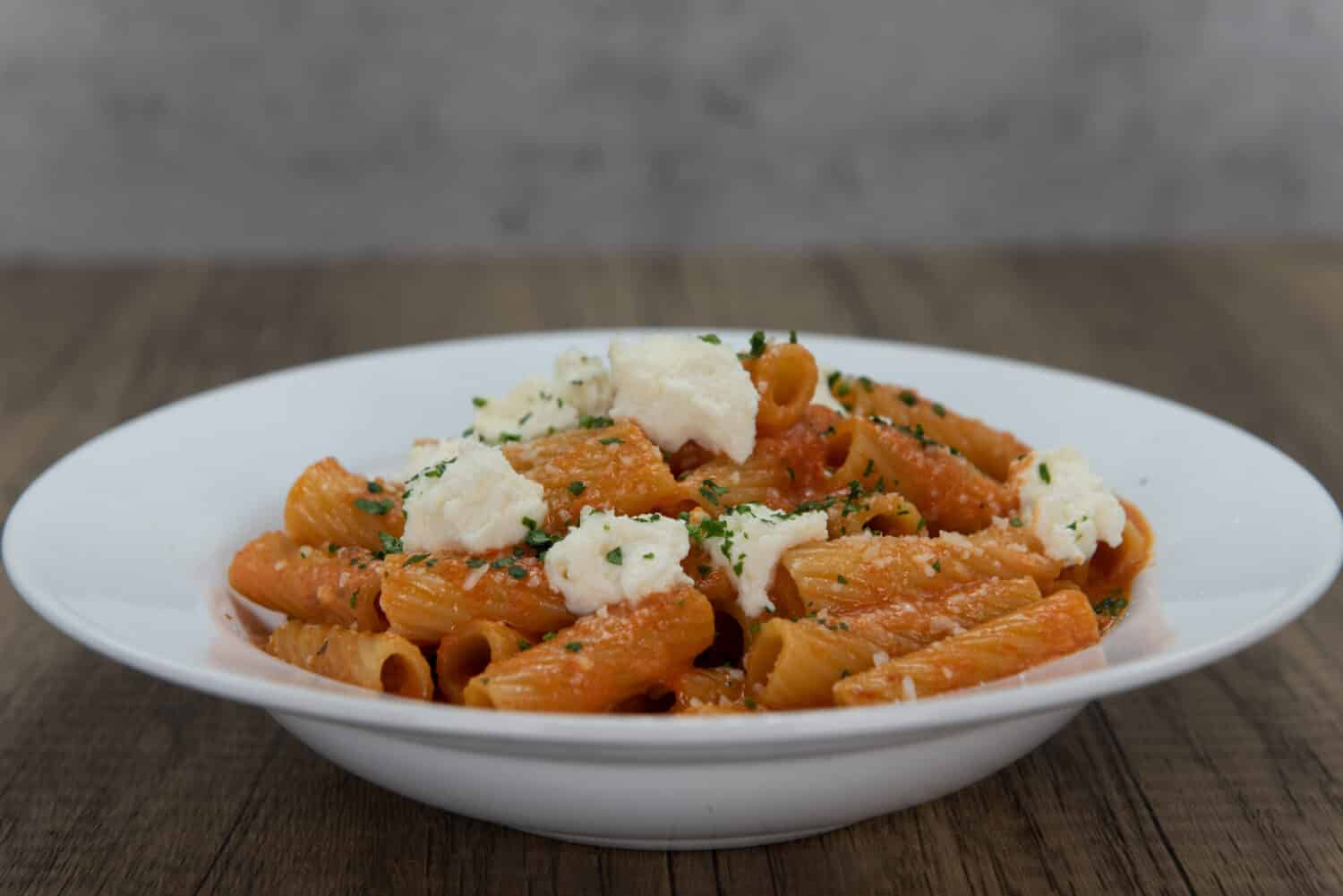 Baked Italian noodles with cheese toppings fills the bowl for a complete meal.