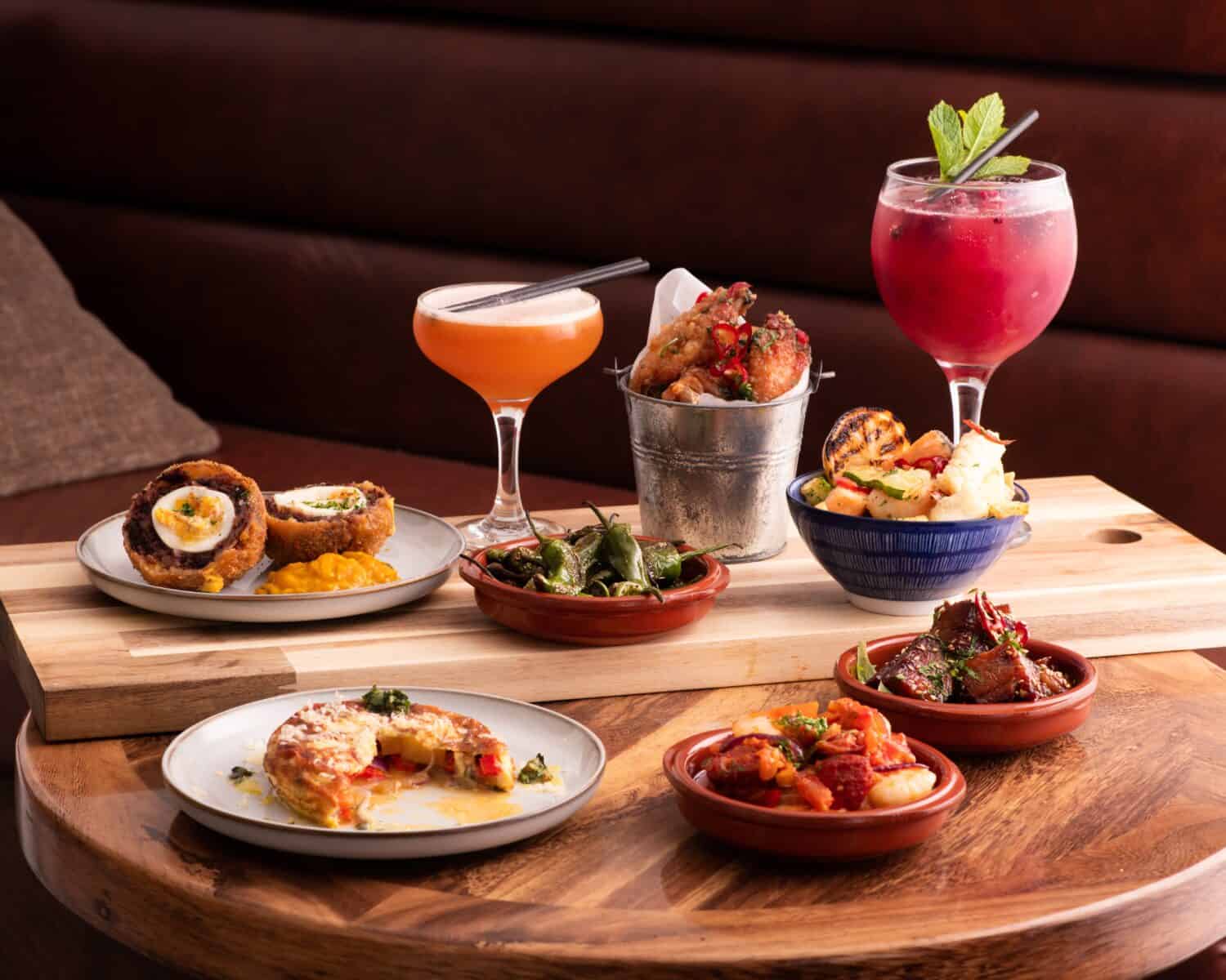 Selection of Tapas and Cocktails including Prawns, Spanish Omelette and Scotch Egg