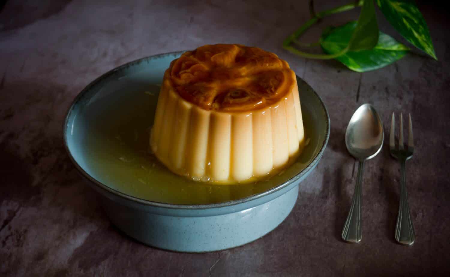 Vanilla flan in turquoise dish