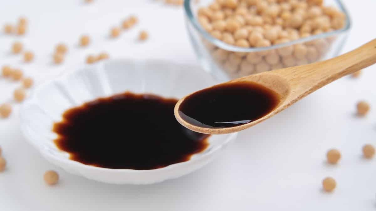 Japanese soy sauce and raw soybeans.