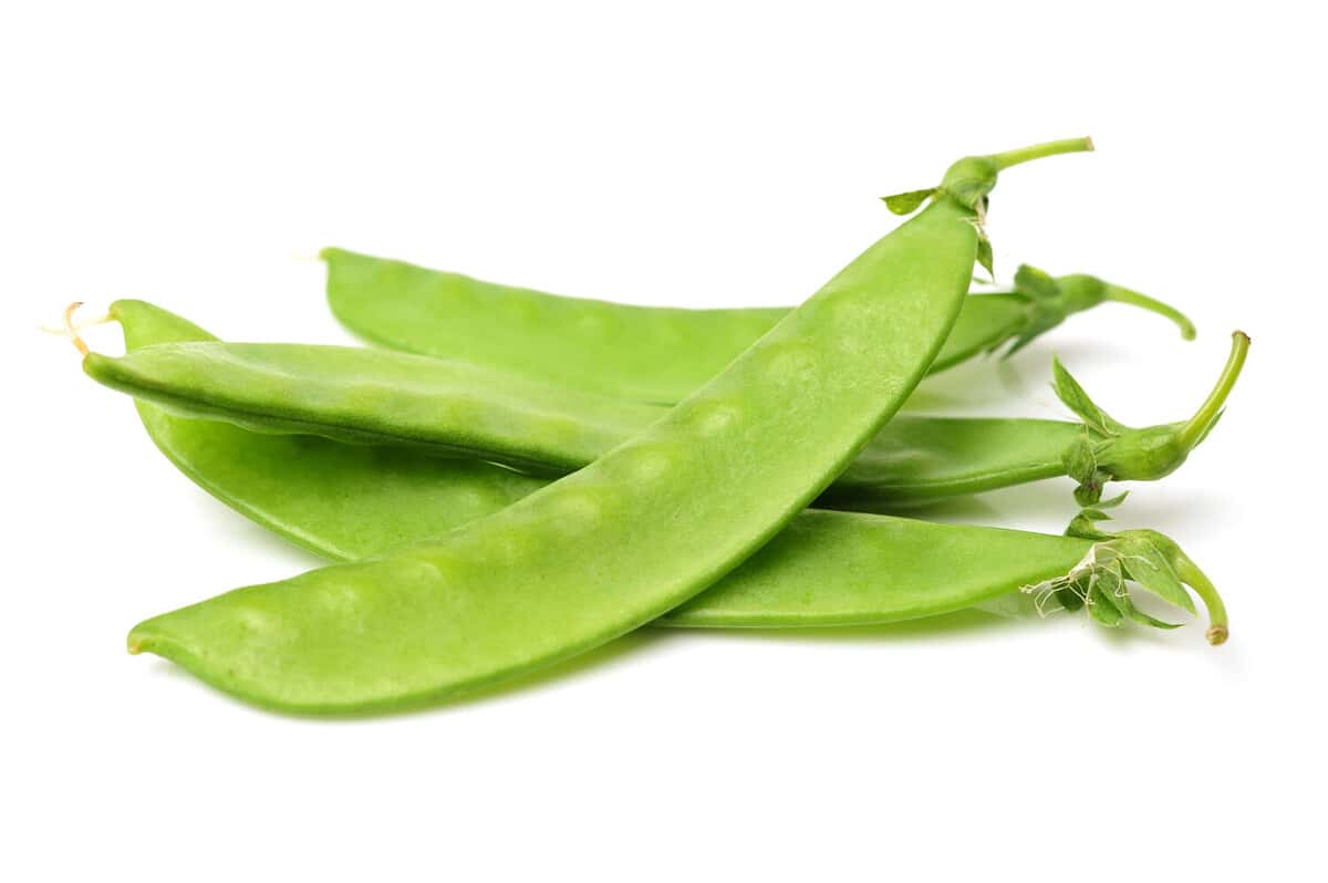 Snow peas isolated on white background