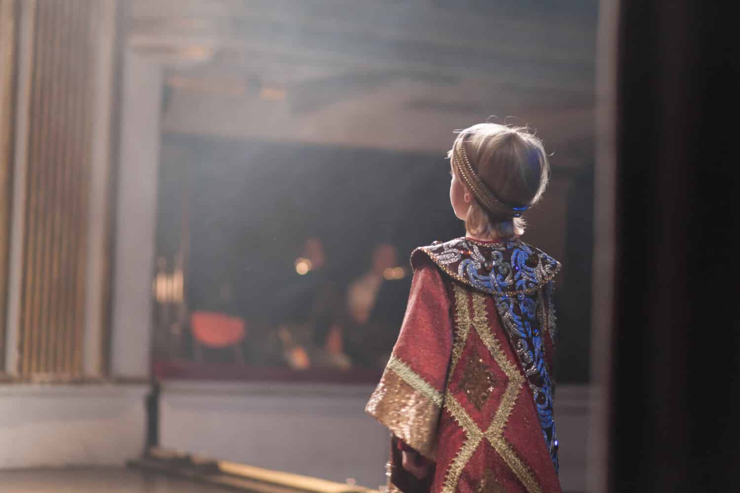 boy in medieval costume acting 