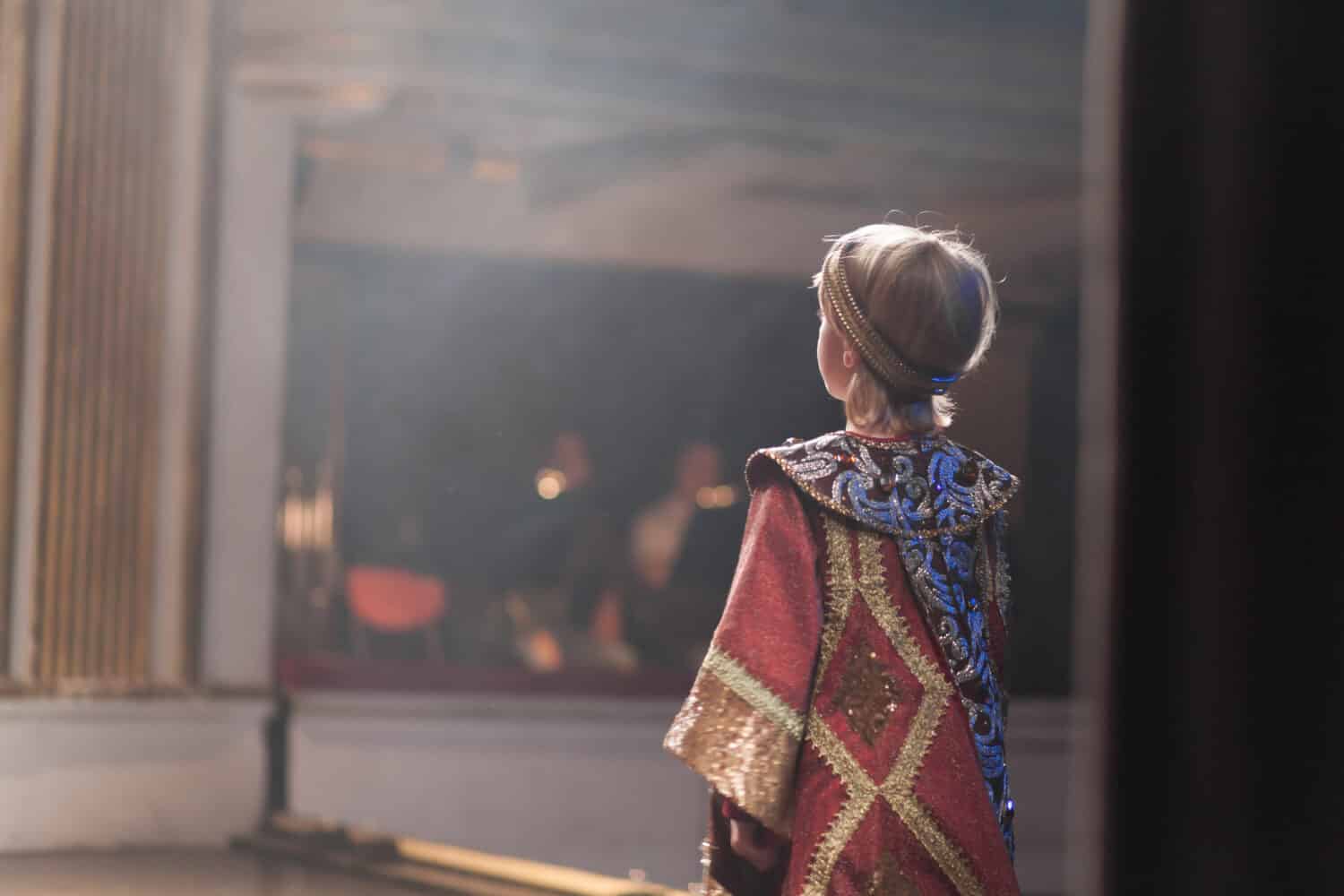 boy in medieval costume acting