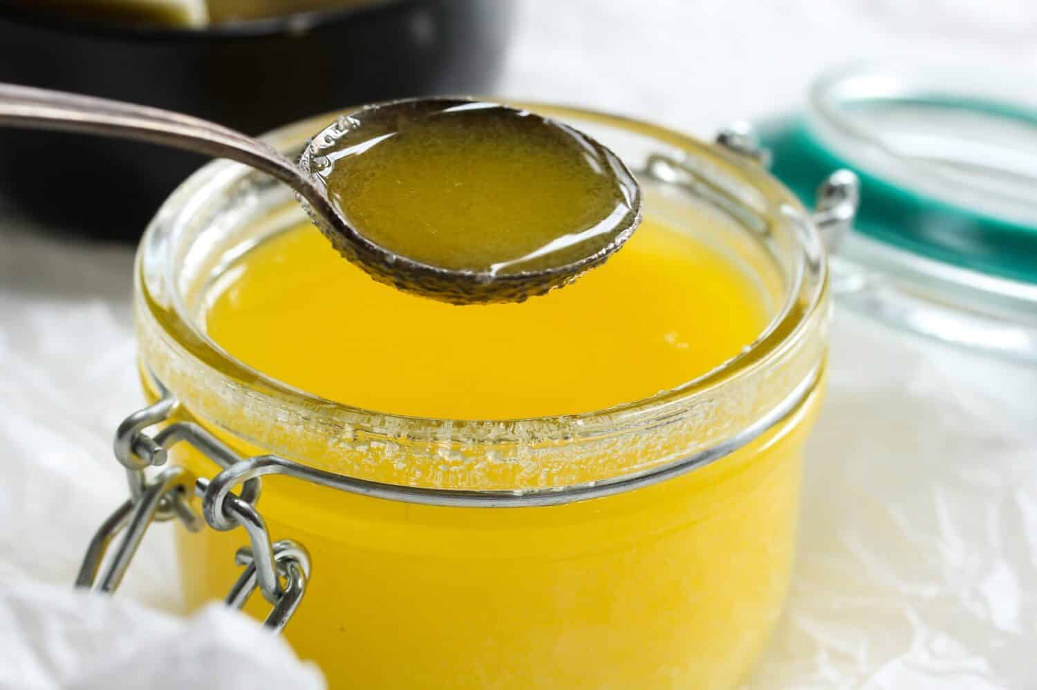 Ghee or clarified butter close up, selective focus
