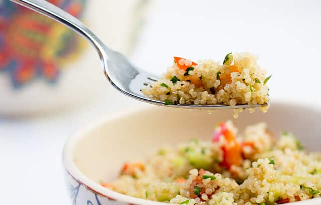 quinoa salad close up in a white bowl