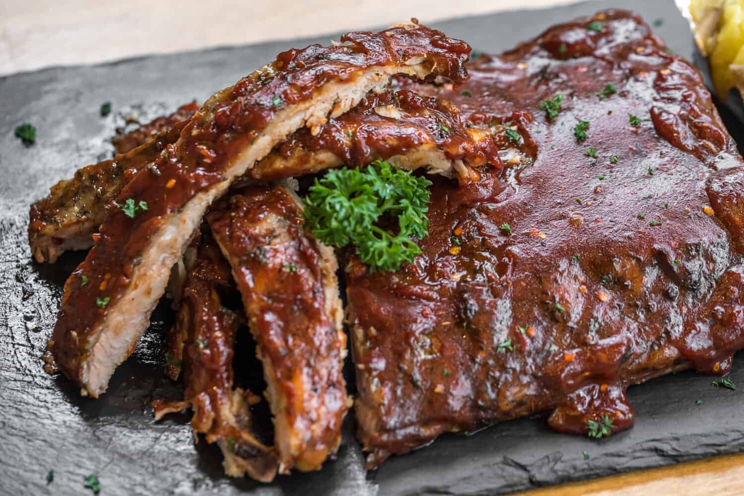 Grilled Barbecued Pork Baby Back Ribs, close up