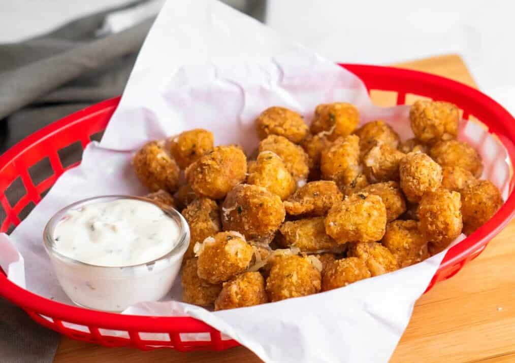 Wisconsins fried cheese curd cook to perfectly golden brown in local diner