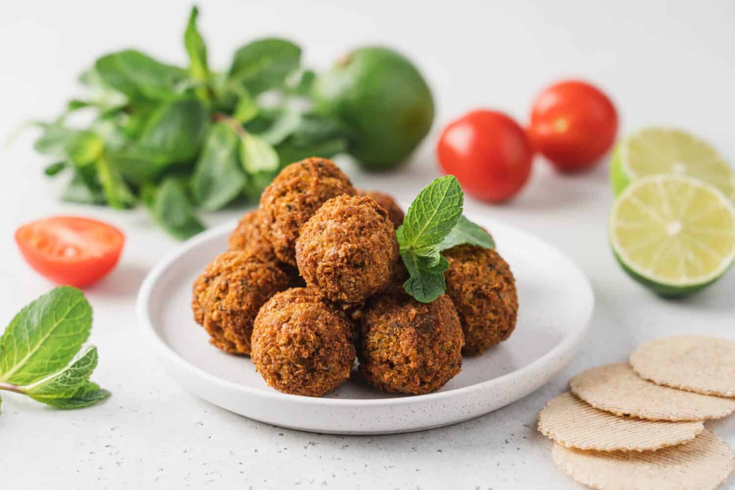 Bowl of fried falafel. Middle eastern traditional snack. Side and Close-up view