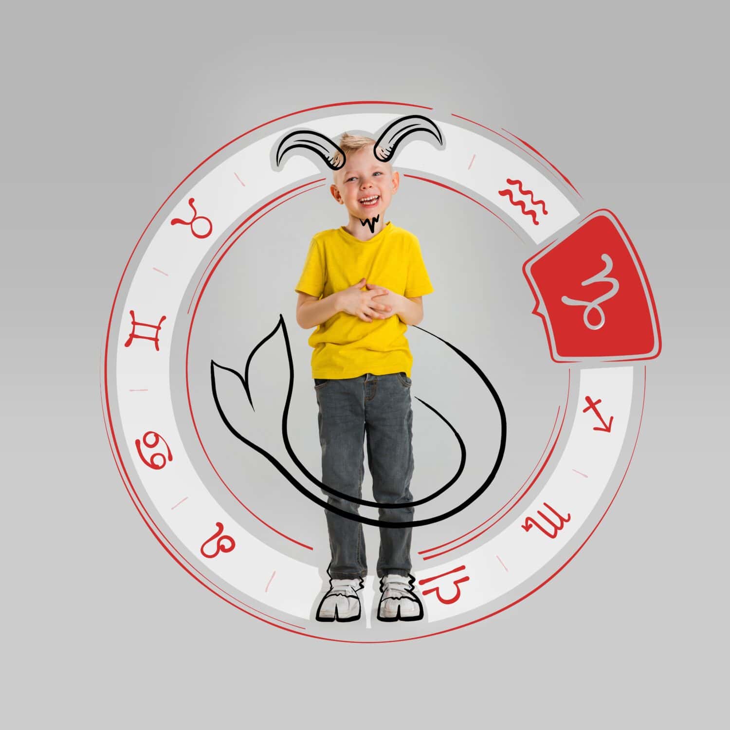Capricorn. Thematic image of cute kid with drawing of zodiac signs isolated on grey background with pencil sketches. Concept of birthday, person's character, year, horoscope. Design for card