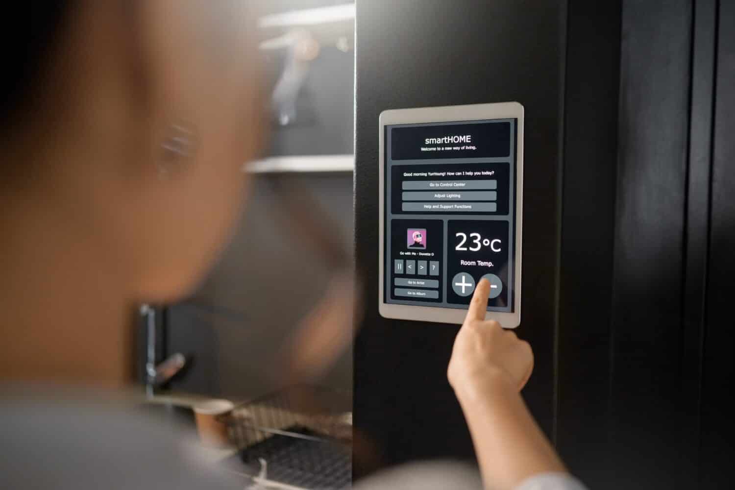Smart home, IOT wall system and woman with digital app monitor for thermostat heating, temperature control or air conditioning. House automation, future AI software and girl with interactive ui tech