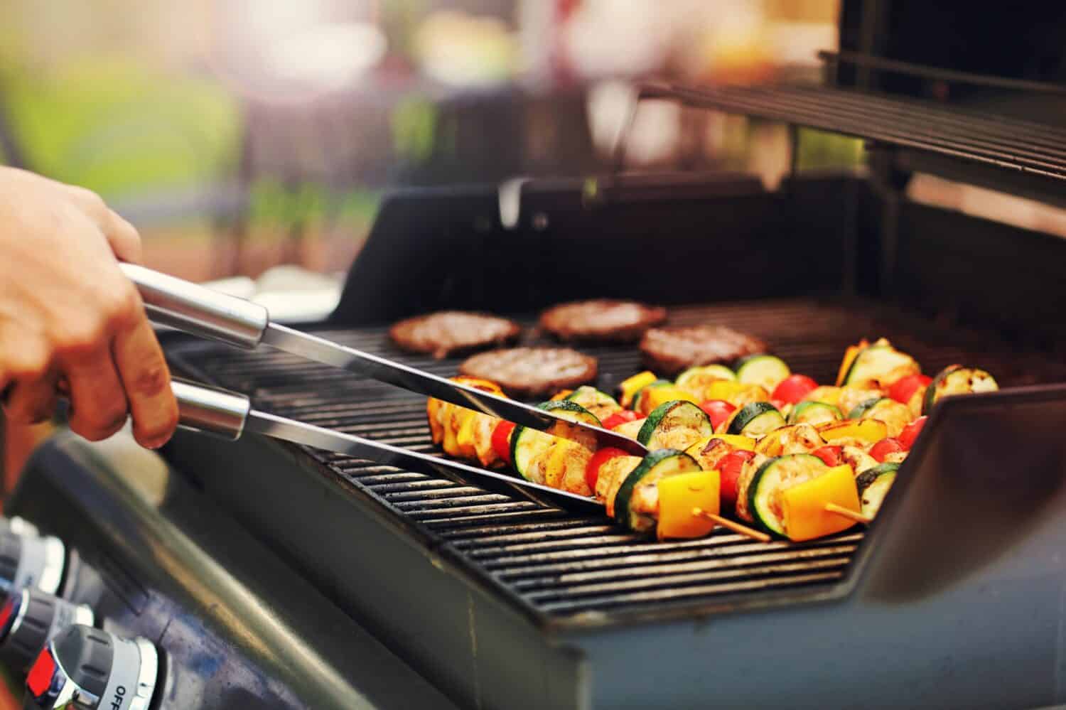 Closeup of grilled shashliks on grate