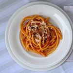 Bucatini all Amatriciana Italian Pasta from Lazio and Rome with Guanciale and Tomatos