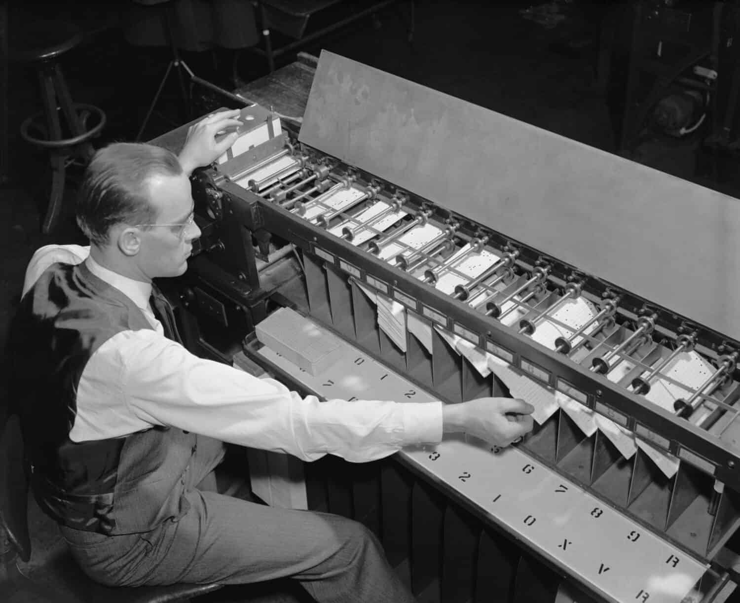 U.S. Bureau of the Census computer operator at a punch card sorter, ca. 1940.
