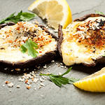 Mushrooms stuffed with four cheeses and topped with crispy panko bread crumbs