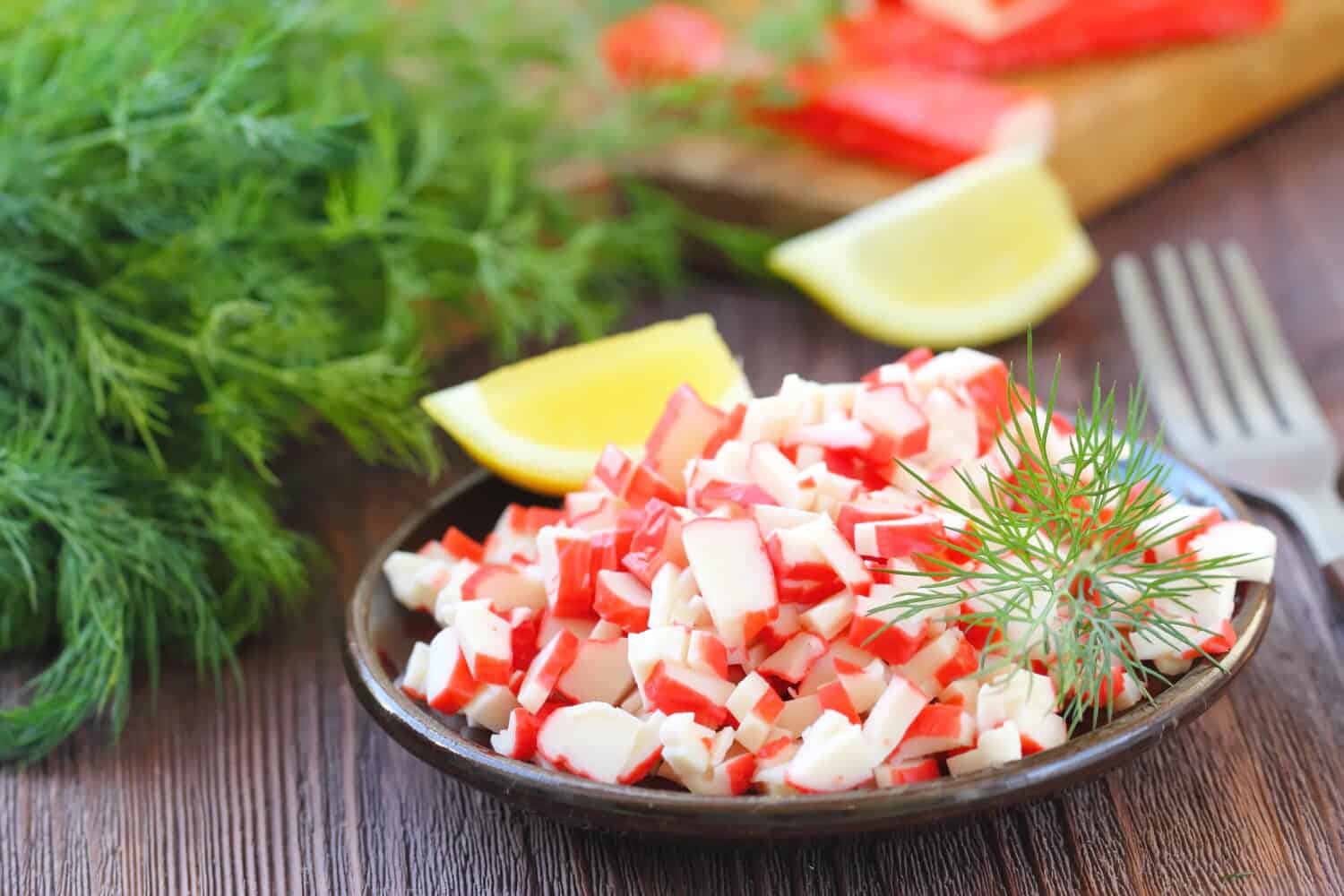 Delicious salad with crab sticks prepared for eating