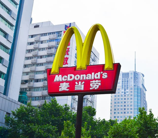 MIANYANG, CHINA - May 31: A Logo of McDonalds at a restaurant in MianYang, China on May 31, 2013.McDonald's is one of the main fast-food restaurant chain in China.