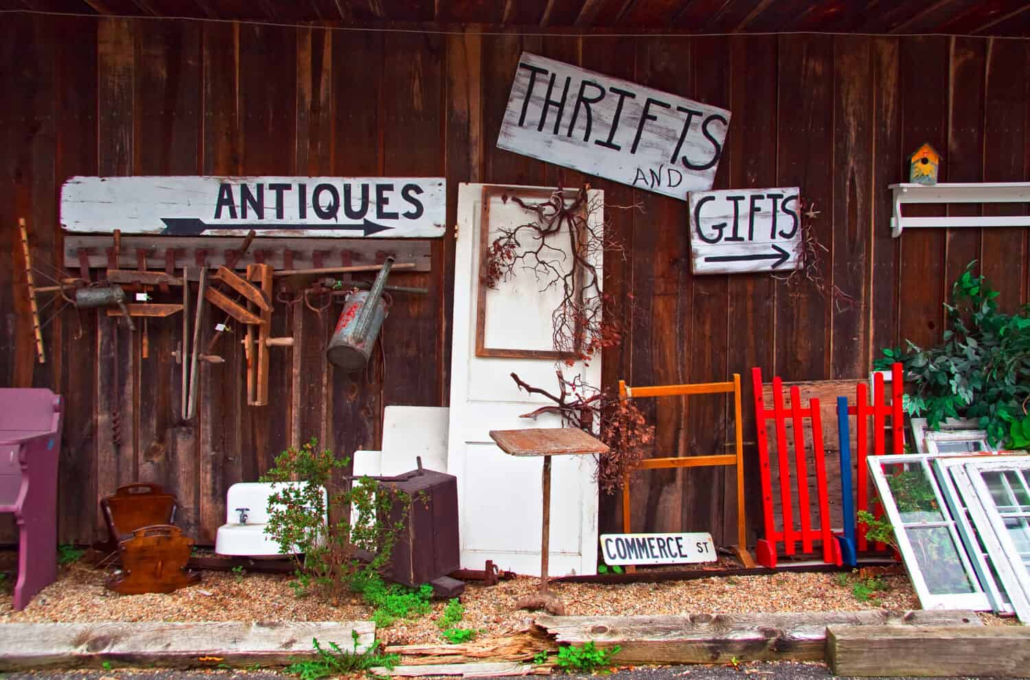 View of antiques thrift store with various items displayed.