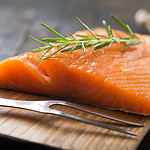 smoked salmon on wooden board