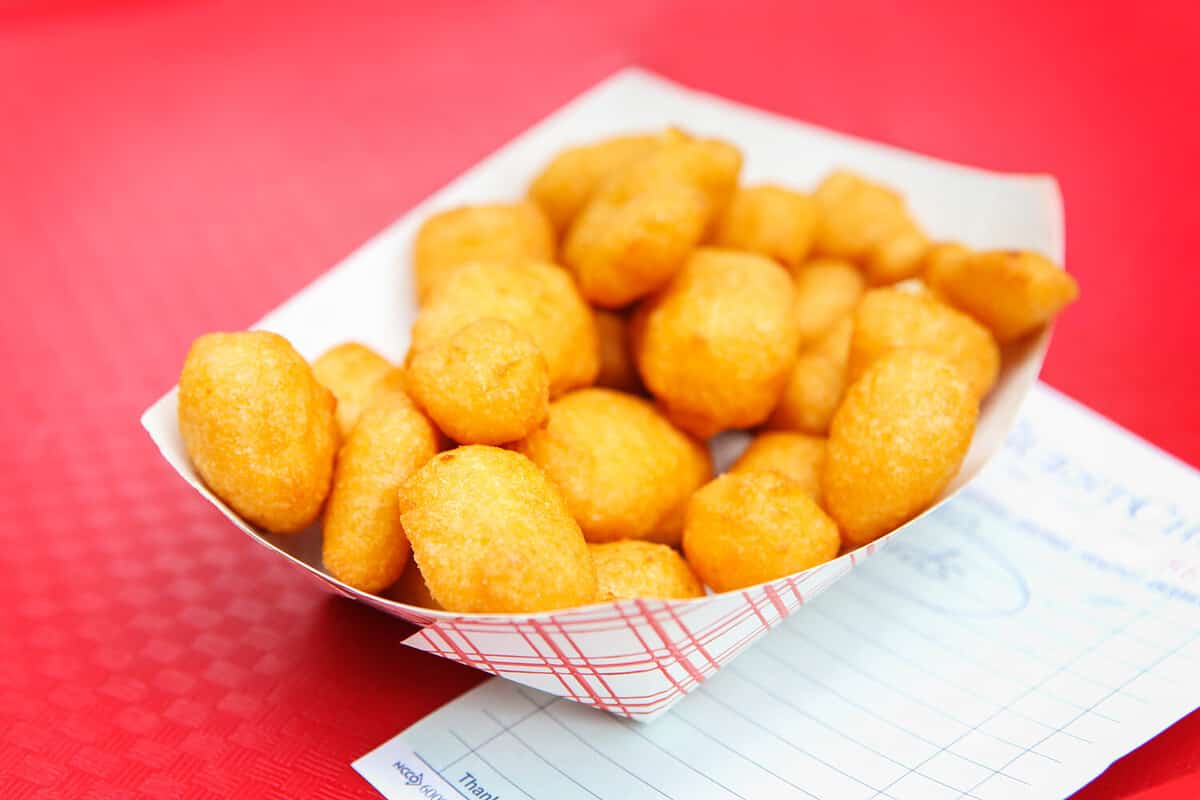 Golden fried cheese curds. Shallow focus.