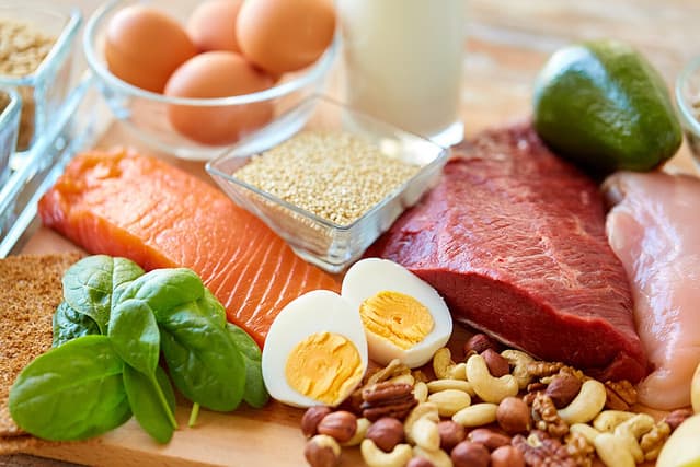 healthy eating and diet concept - natural rich in protein food on table