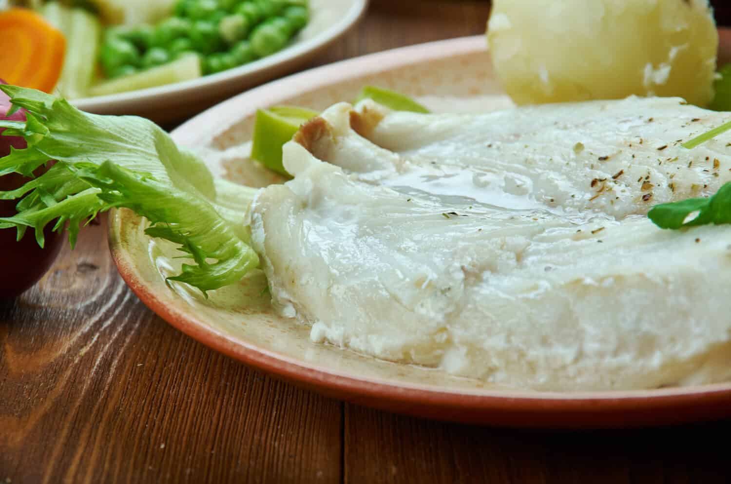Lutefisk, traditional dish of some Nordic countries, Norwegian cuisine, Traditional assorted dishes, Top view.