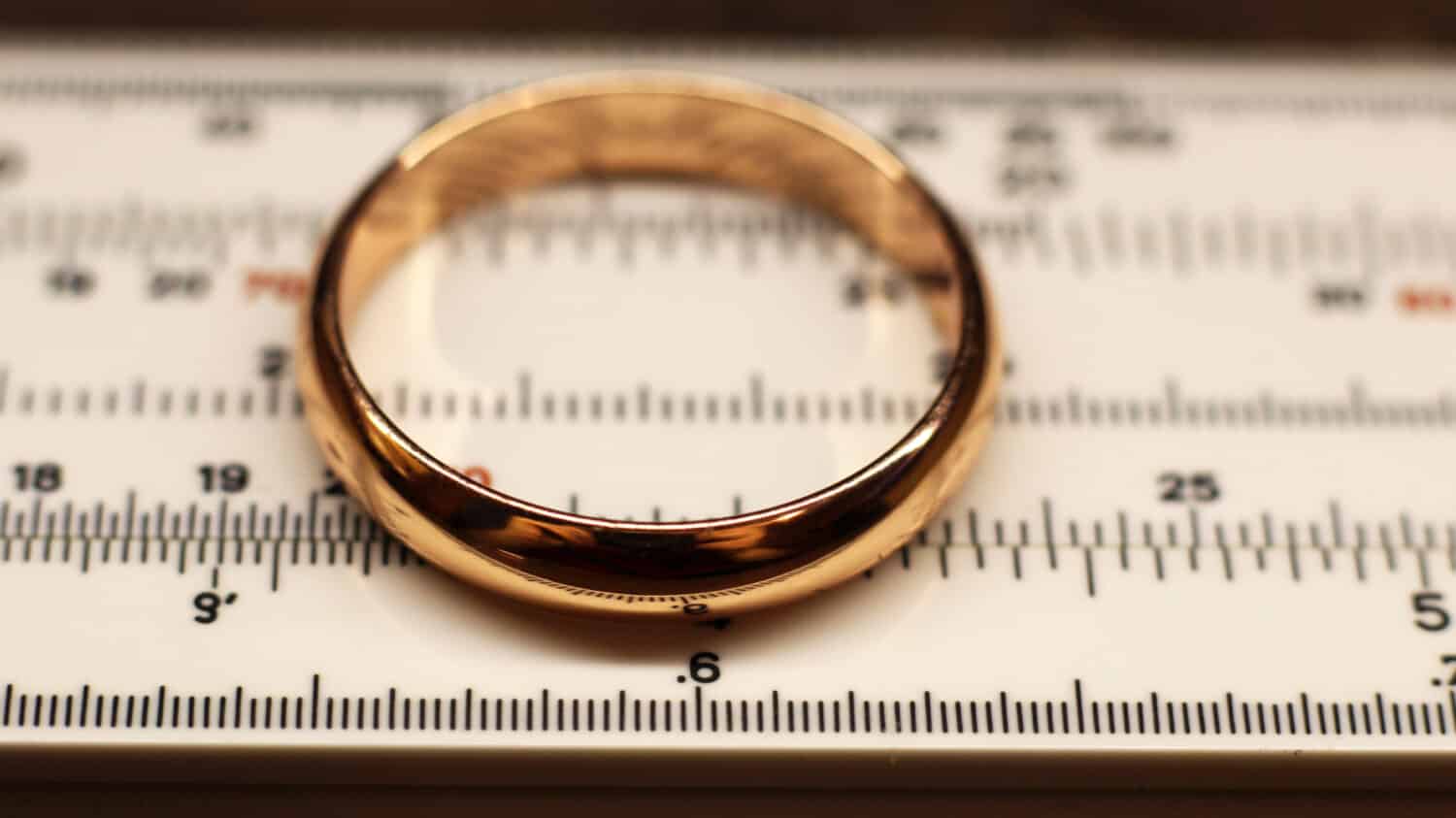 Wedding ring and measuring instrument, vintage