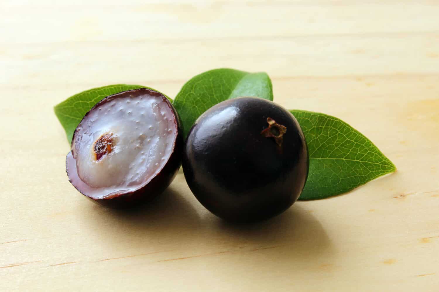 Exotic Jabuticaba fruit on wooden table