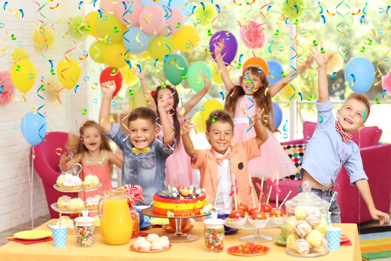 Children's funny birthday party in decorated room