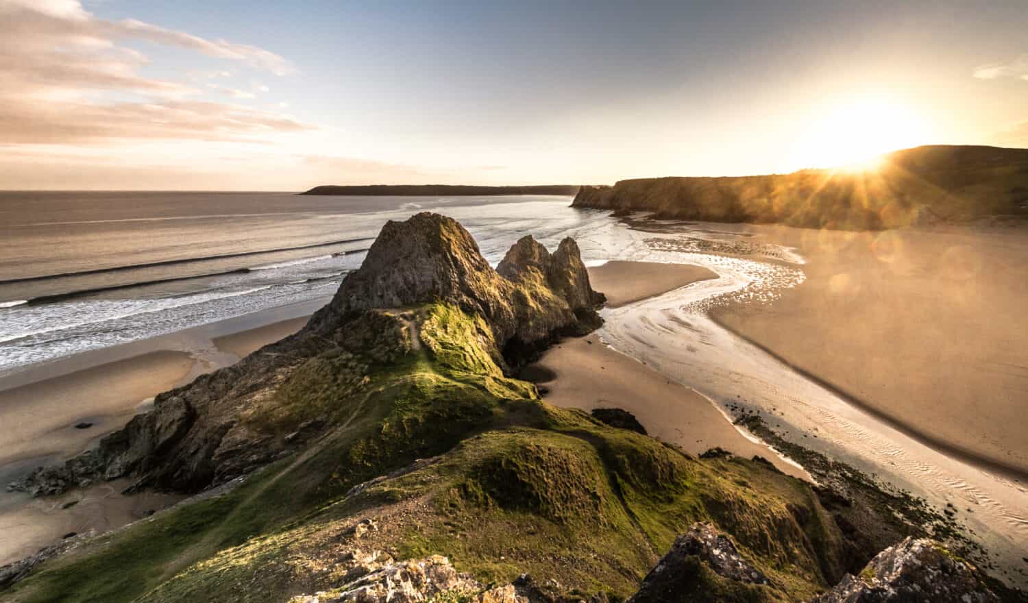 Panoramic of suntset at Three Cliffs in the Gower Peninsula, South Wales, UK. Taken May 2018