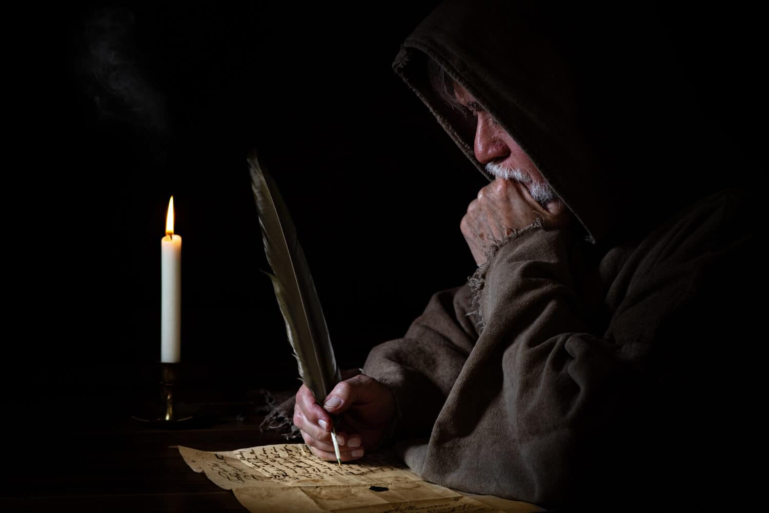 Medieval poor monk writes letter