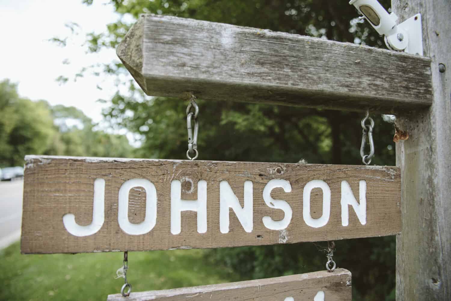 Wooden sign with the name Johnson