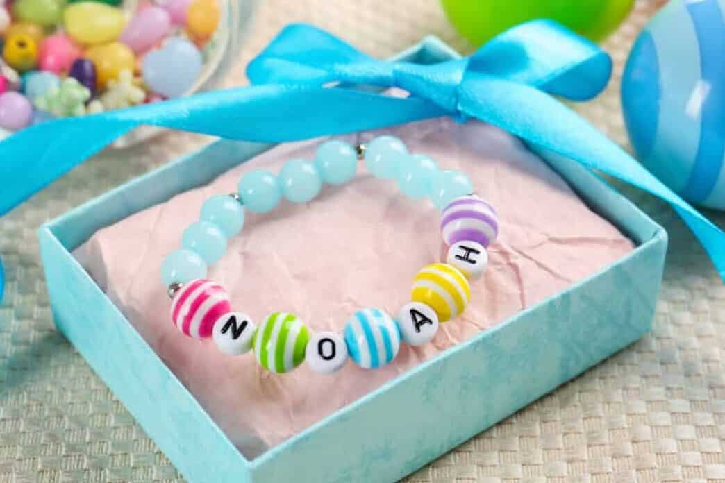 Bracelet with baby name Noah in blue gift box