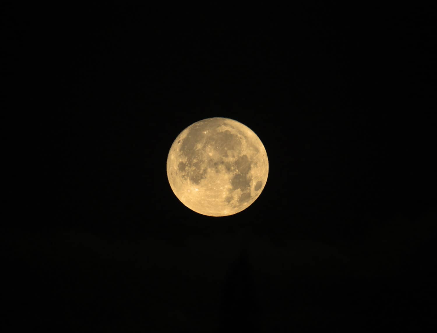 Full Moon named Cold Moon rising on black background