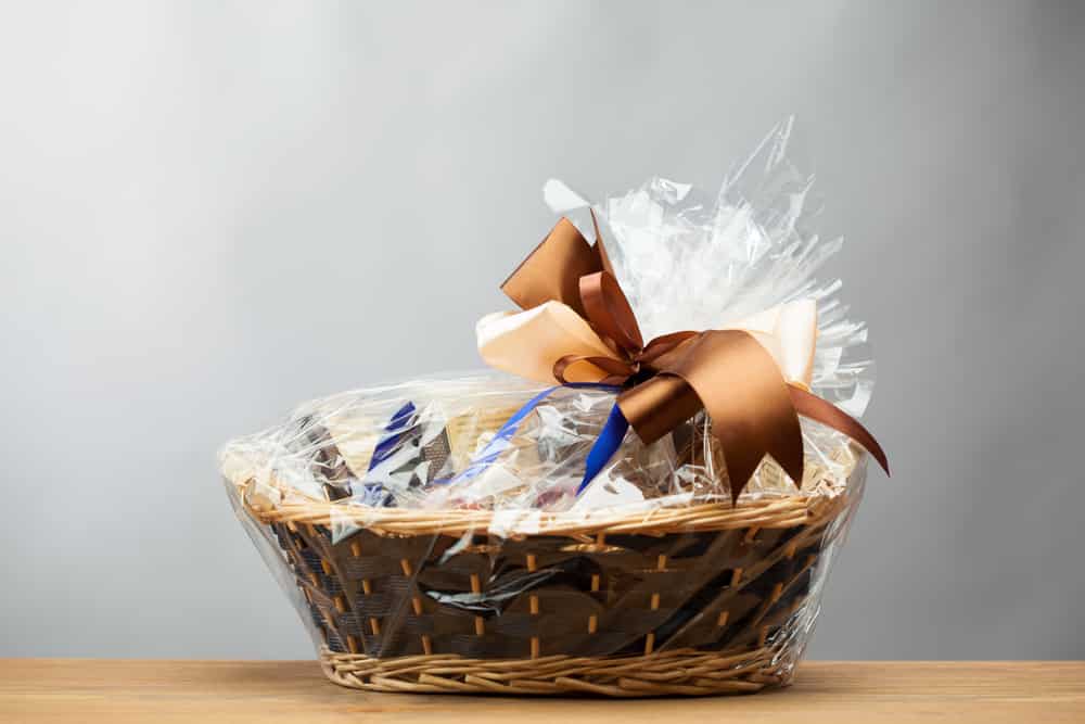 gift in a basket, grey background