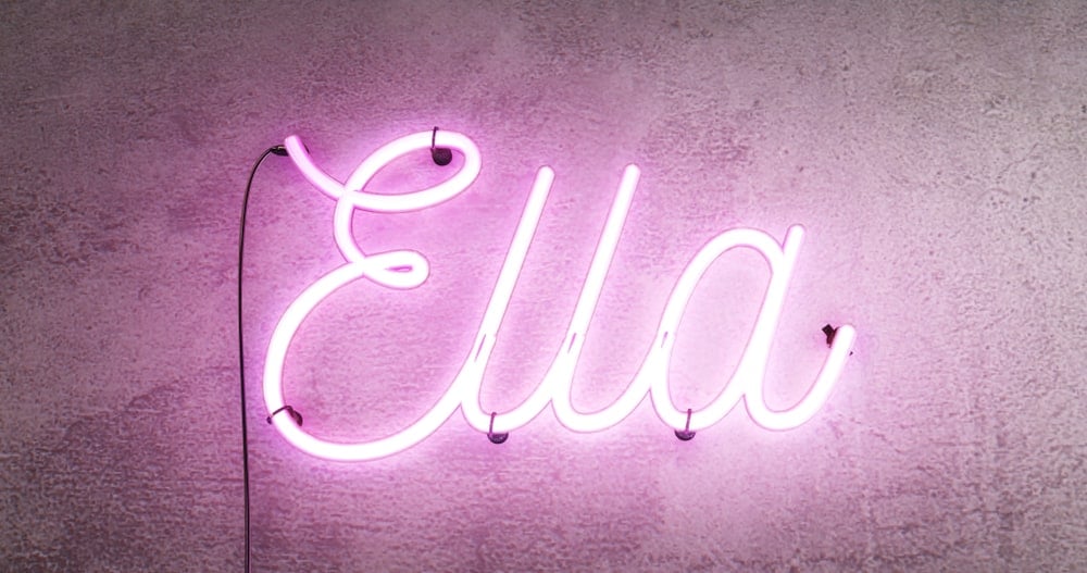 Bright pink Neon sign saying the name Ella