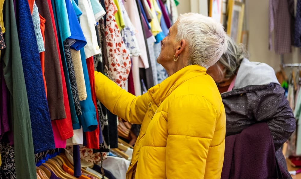 Elderly Lady with her Daughter Shopping in Second Hand Store