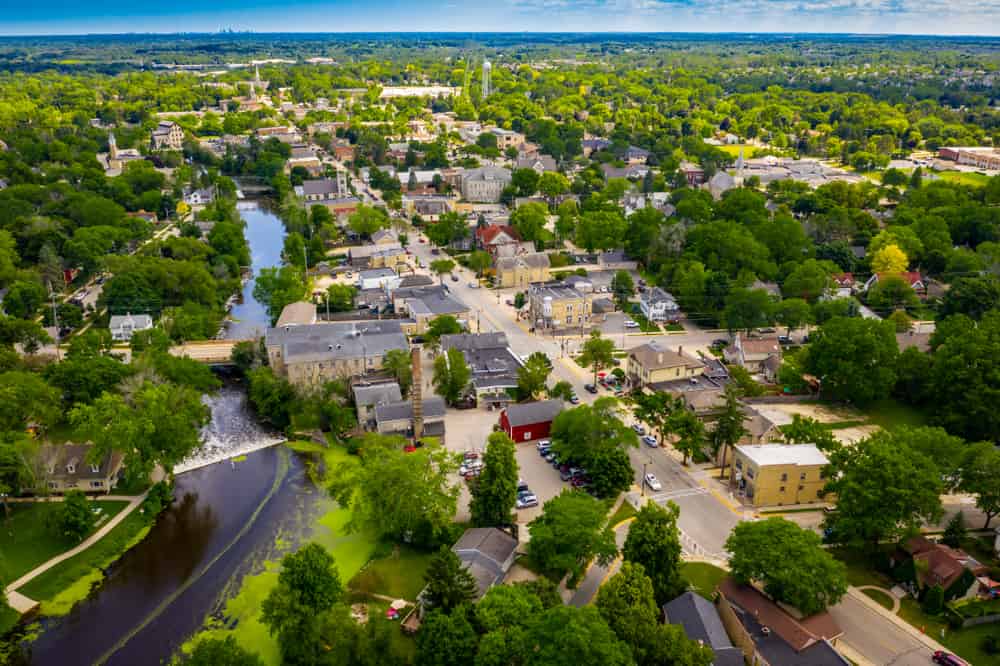 Aerial view of downtown Cedarburg Wisconsin known for its quaint downtown district lined with historic buildings.