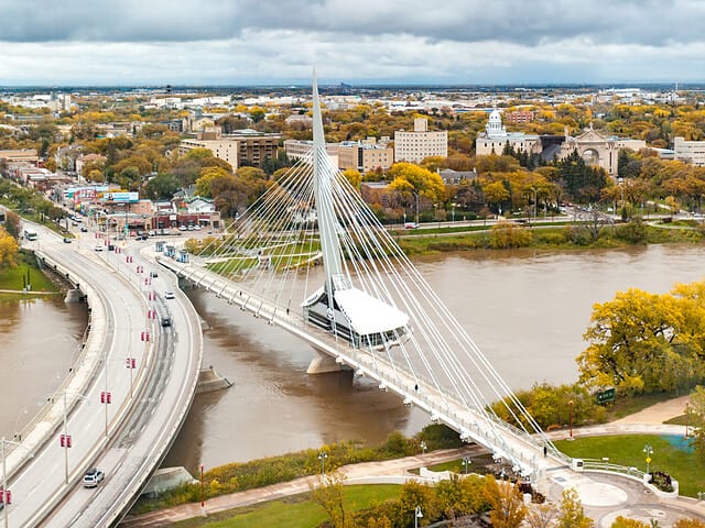 Winnipeg, Manitoba/Canada - Aerial view of the Provencher Bridge (left) and the Esplanade Riel footbridge (right) during autumn season