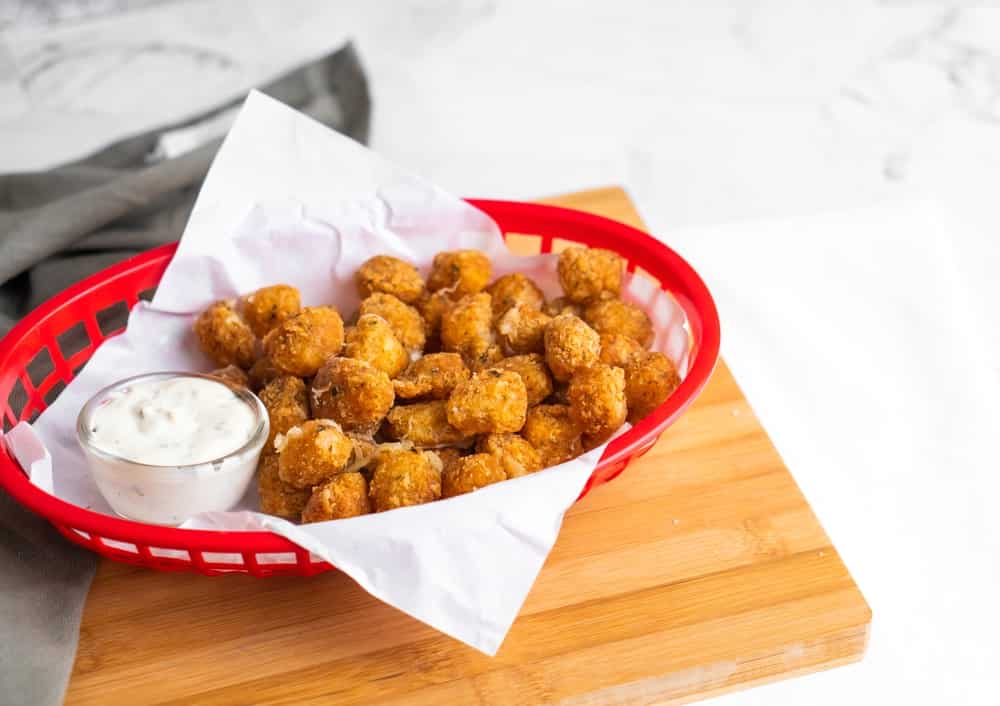 Wisconsins fried cheese curd cook to perfectly golden brown in local diner