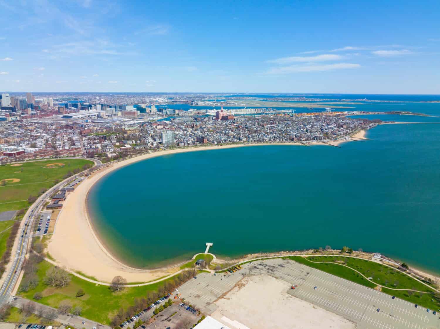 Carson Beach and Dorchester Penninsula historic district aerial view in spring from South Boston, Massachusetts MA, USA. 