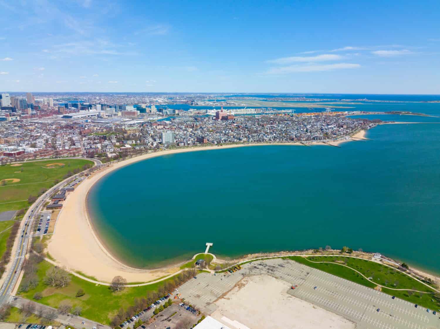 Carson Beach and Dorchester Penninsula historic district aerial view in spring from South Boston, Massachusetts MA, USA.