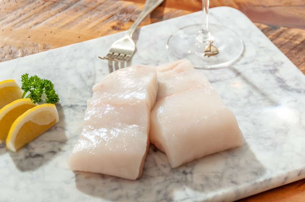 Chilean Sea Bass Fillet on Marble Cutting Board, Sea Bass fillet, Fresh, Raw Seafood Fillet