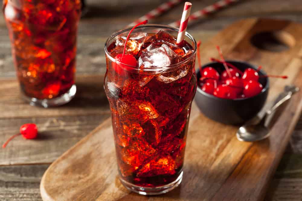 Sweet Refreshing Cherry Cola with Garnish and Straw