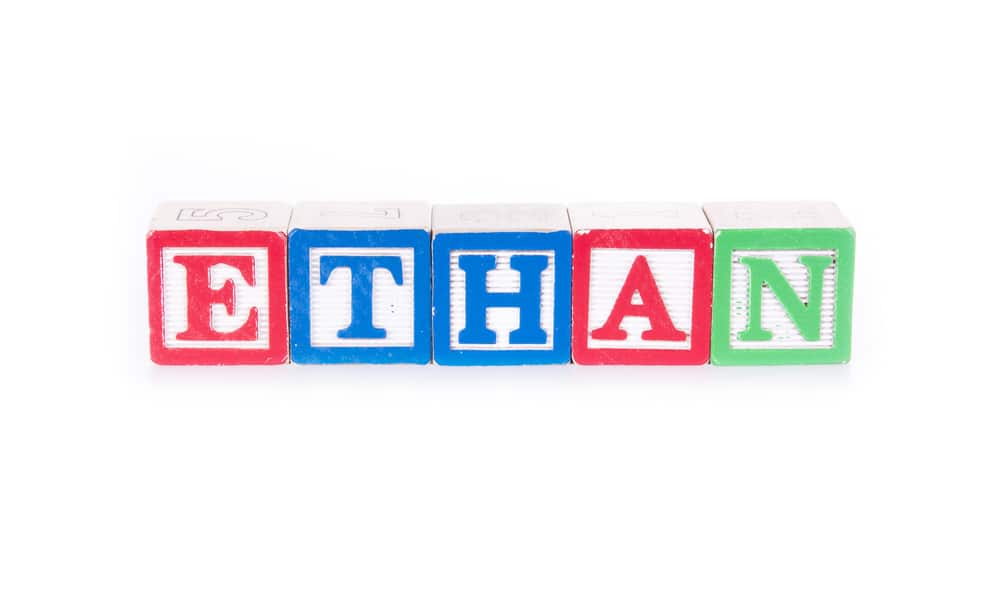 Toy blocks spelling out the name "ETHAN"