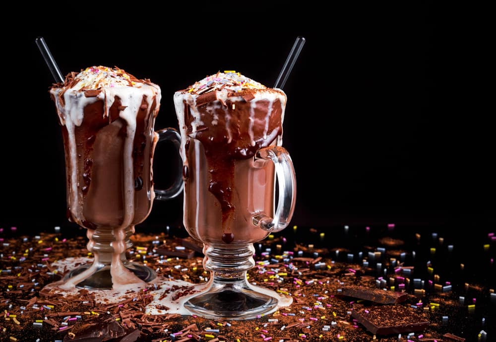 Hot chocolate ice cream float dessert in a big cup