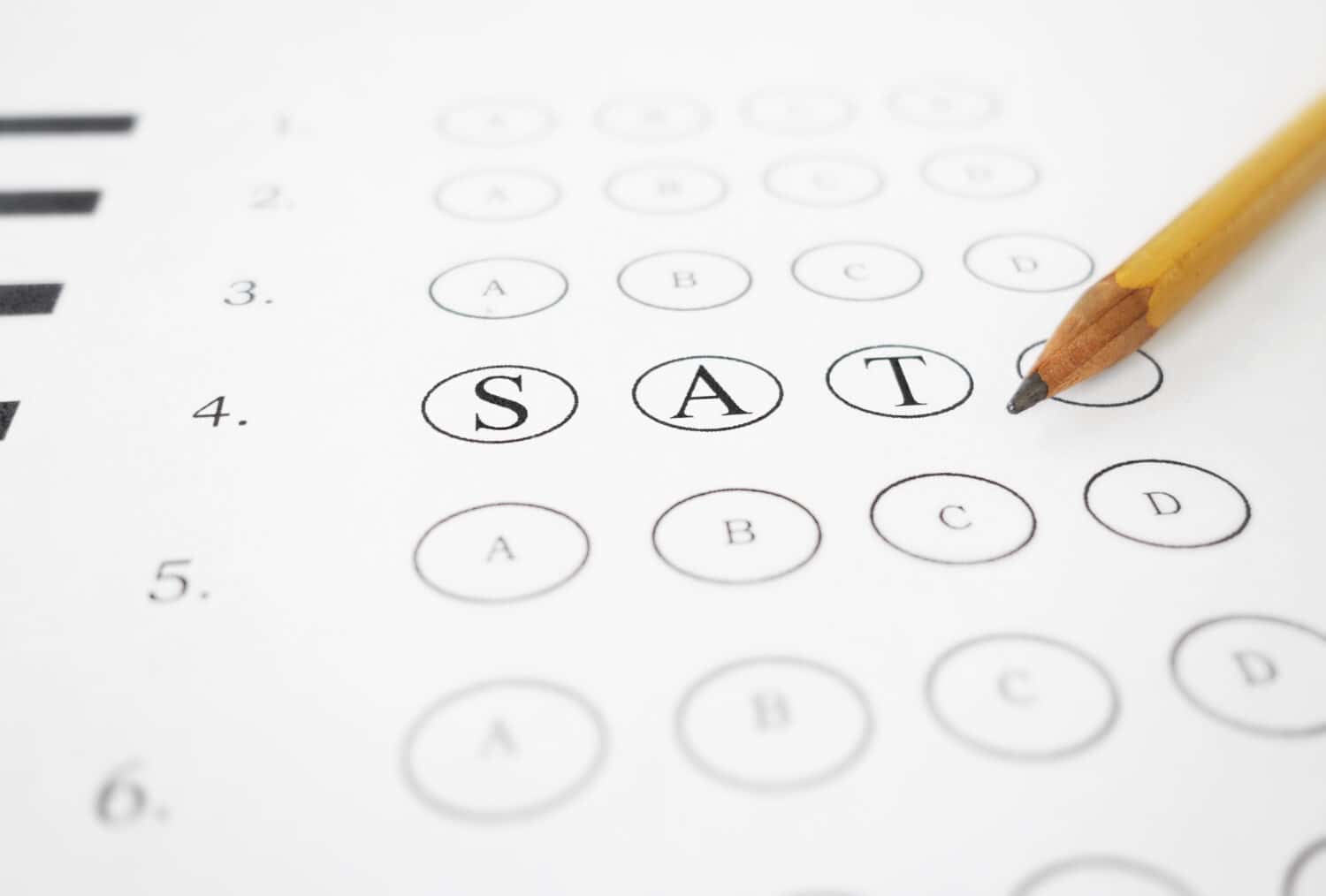 Closeup of multiple choice exam with SAT text and pencil