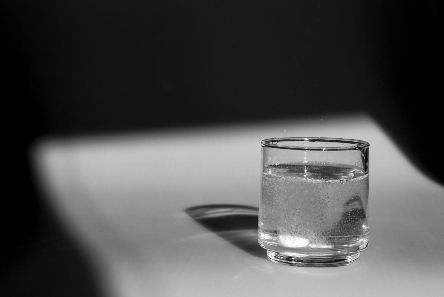 glass of water with medicine