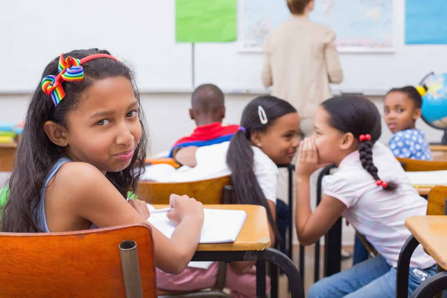 Naughty pupils in class at the elementary school