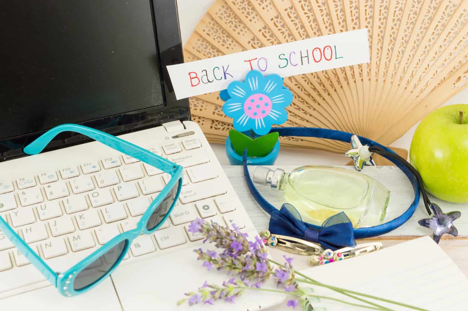 Back to school, laptop and bunch of girl accessories